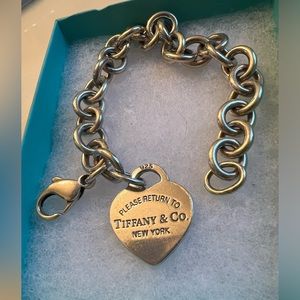 Tiffany & Co.  bracelet and charm. 100% authentic just needs a good poli…